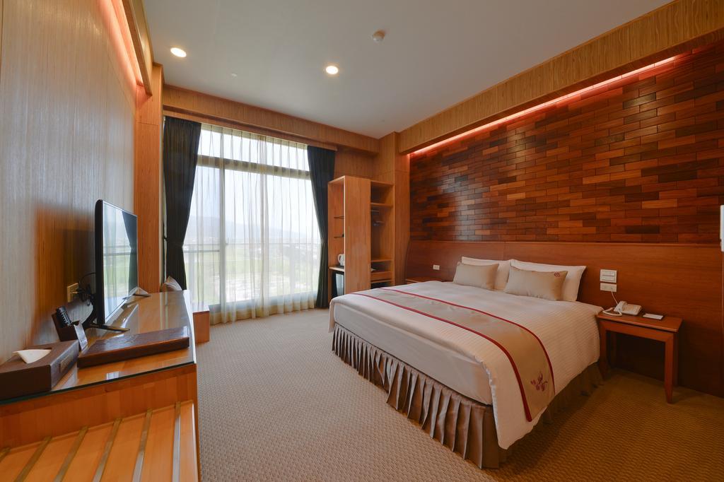 Shandori Hotel Цзяоси Экстерьер фото